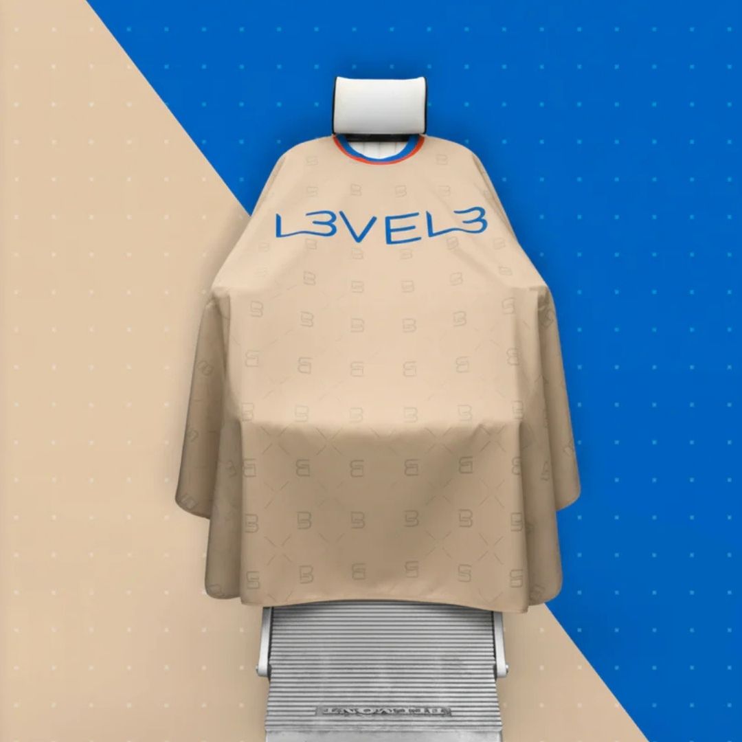 L3VEL3 Capa de Corte Profesional con Cuello de Goma
